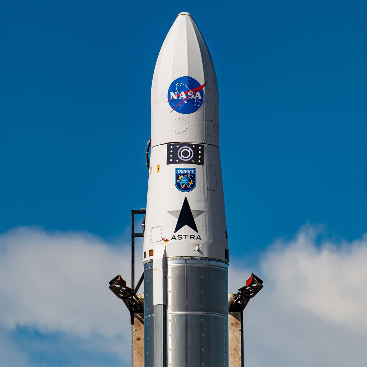 the mark applied as a decal on a launch vehicle, beside the NASA insignia